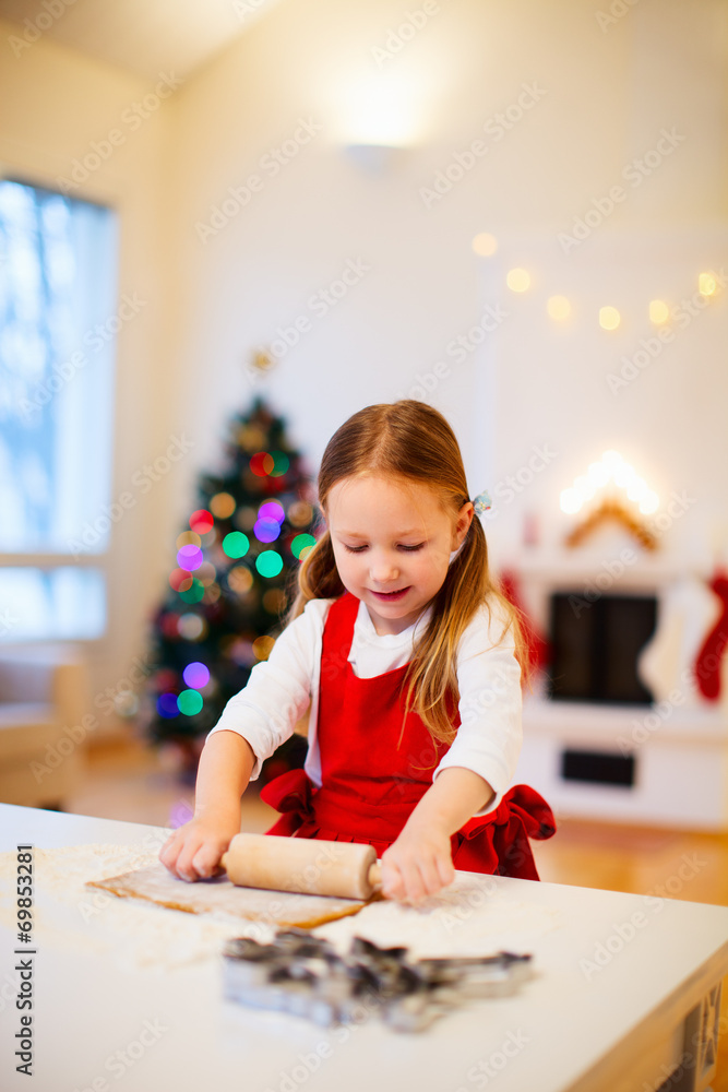 Girl baking Christmas cookies
