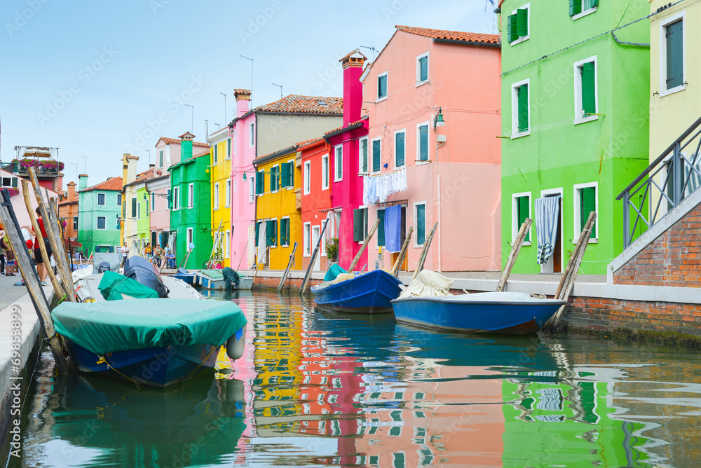 Colorful houses and boats in Burano village