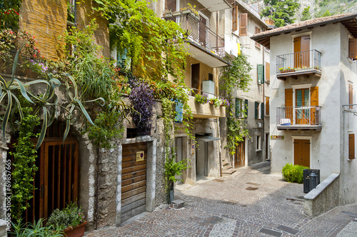 Old narrow street at Limone  Garda lake  Italy