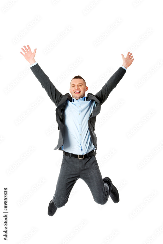 Happy businessman jumping Happy businessman jumping