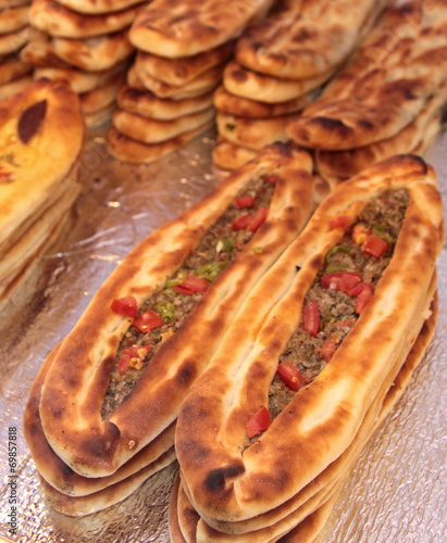 Turkish pizza or meat pita. ( Lahmacun - Etli pide )