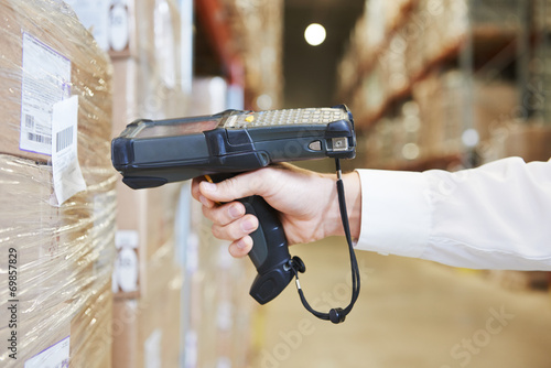 фотографія warehouse worker hand with scanner