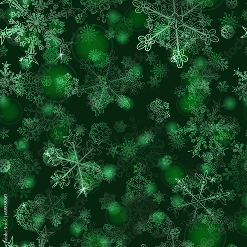 Seamless pattern of snowflakes, in green colors