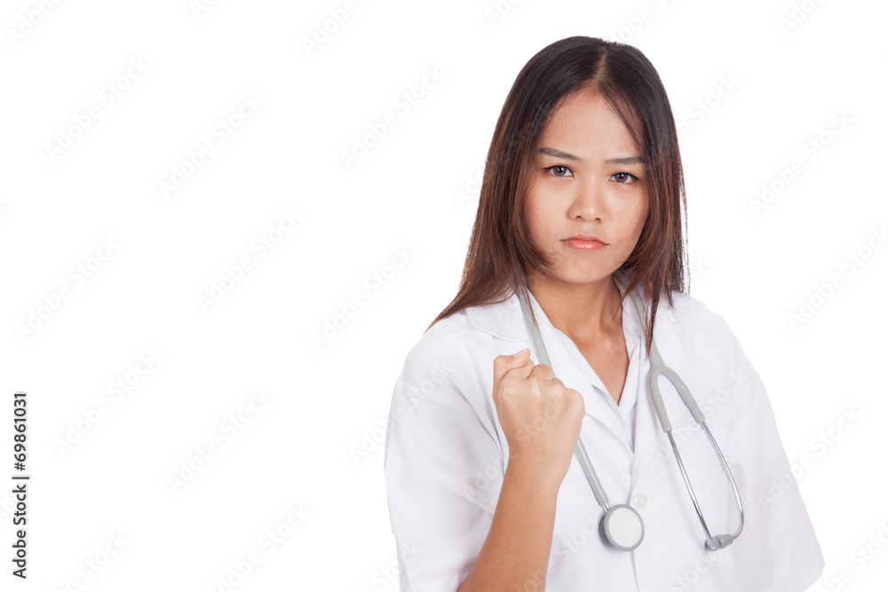 Portrait of confidence young female doctor hold fist Portrait of confidence young female doctor hold fist