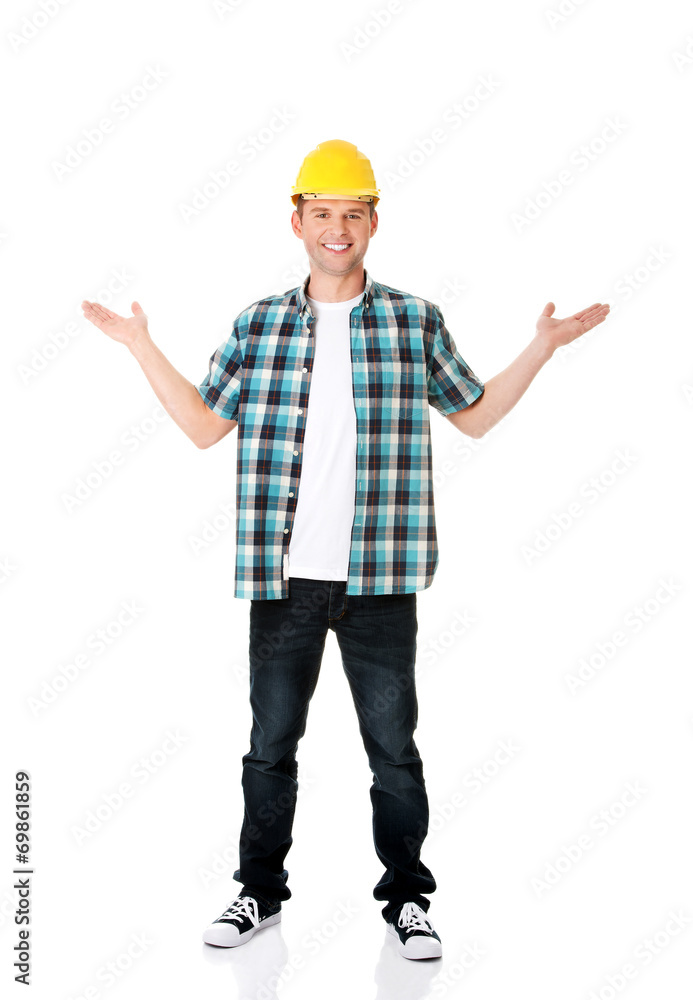 Happy worker presenting copy space. Happy worker presenting copy space.