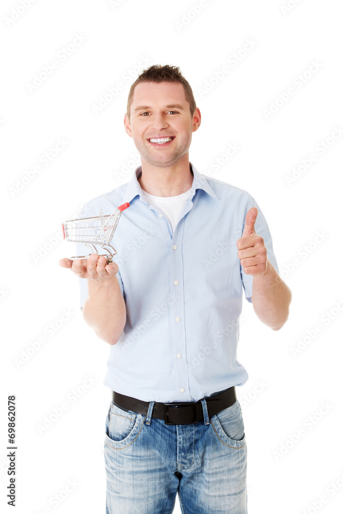 Man with a small shopping basket. Man with a small shopping basket.