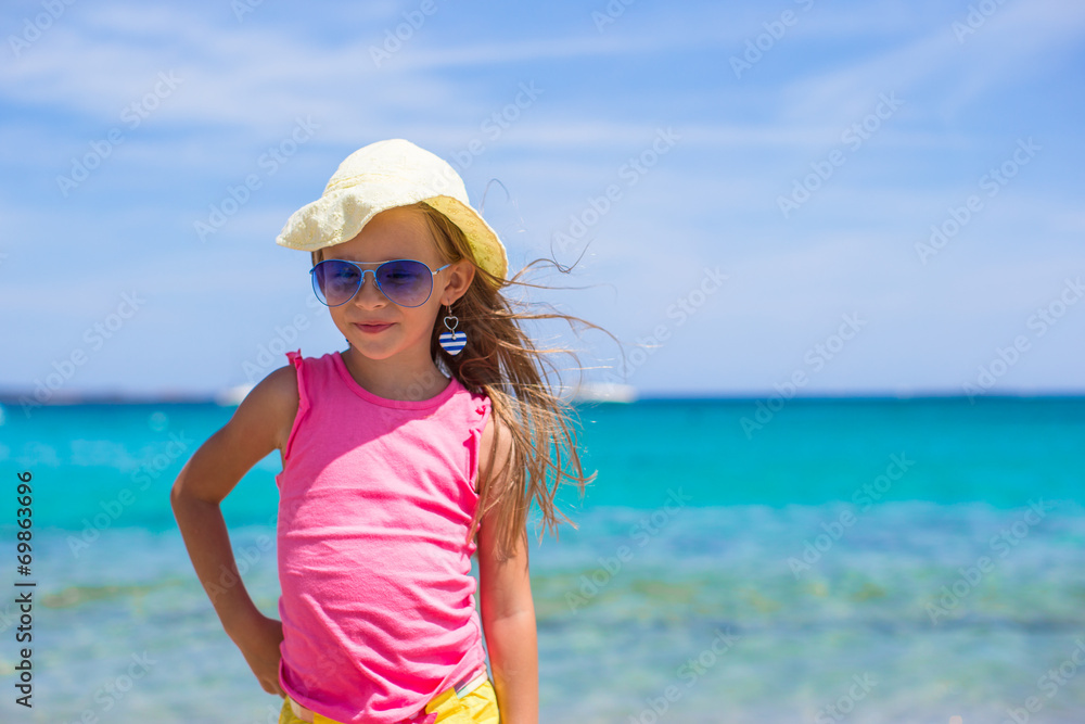 Adorable little girl at tropical beach during European vacation Adorable little girl at tropical beach during European vacation