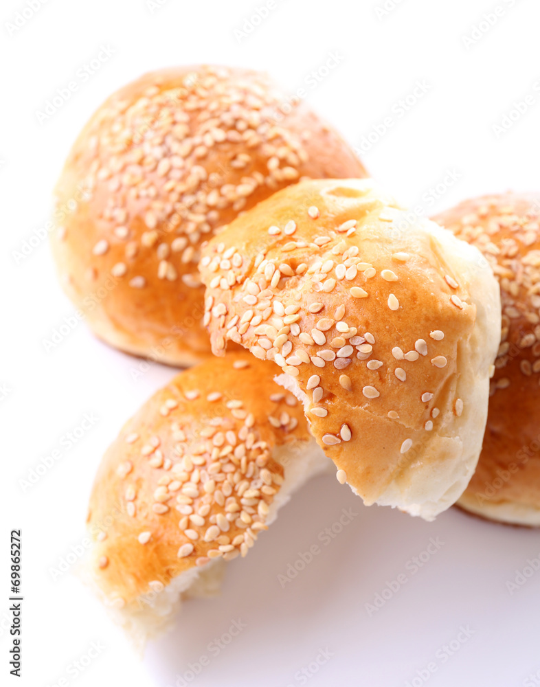 Tasty buns with sesame isolated on white Tasty buns with sesame isolated on white