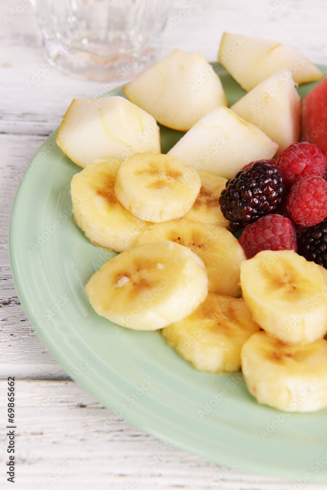 Sliced fruits and berries Sliced fruits and berries