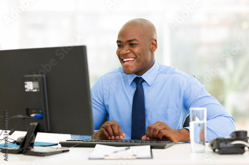 african american businessman working on computer