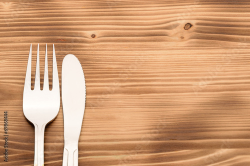 Bilde på lerret Knife and fork set on a wooden vintage table