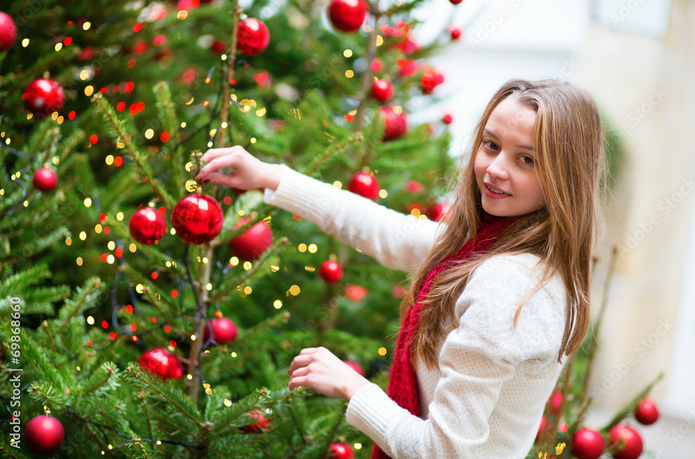 Girl with decorated Christmas tree Girl with decorated Christmas tree