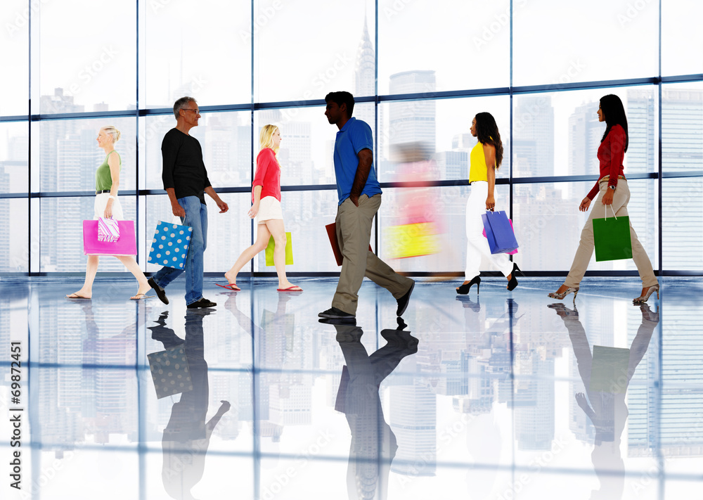 Group of People Walking in a Shopping Mall