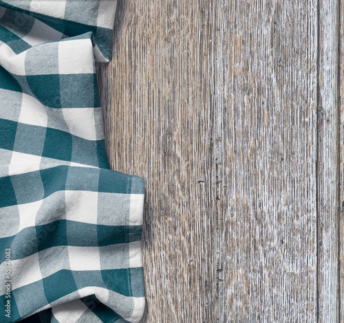 picnic cloth over old woode...