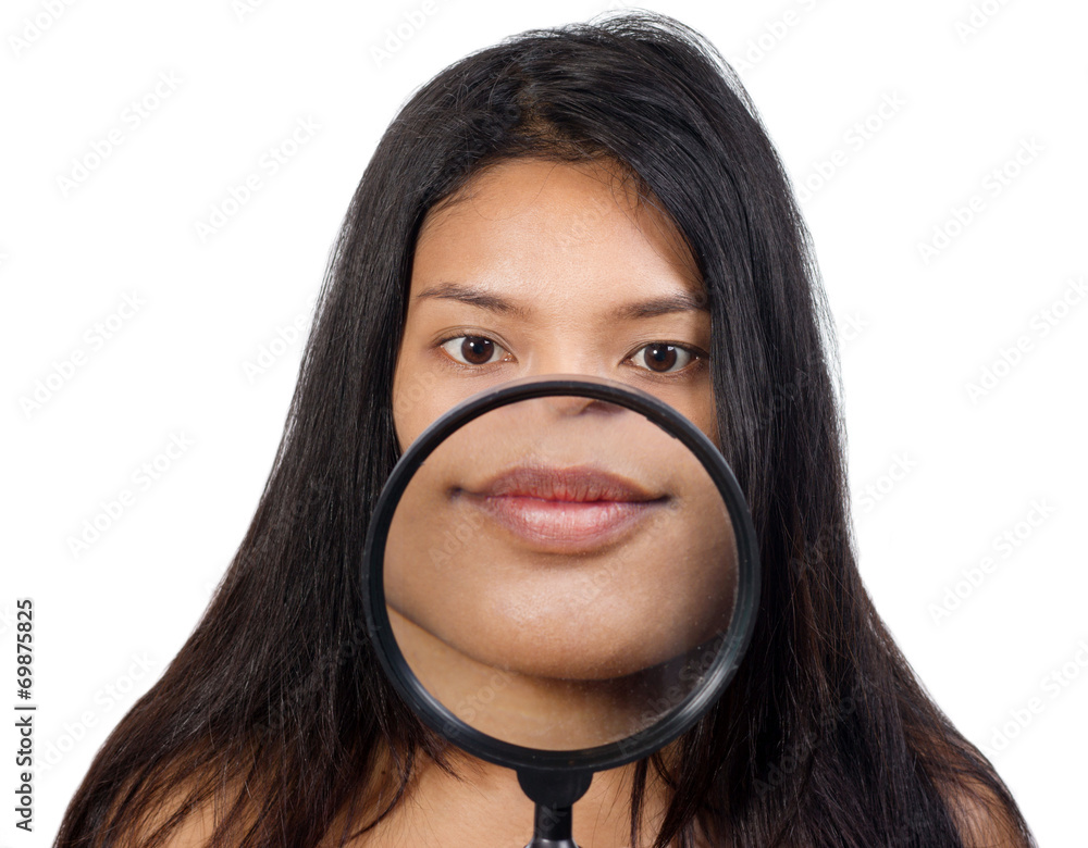 woman holding a magnifying glass in front of her mouth woman holding a magnifying glass in front of her mouth