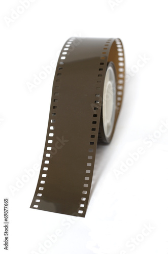 Roll of 35mm film on white background