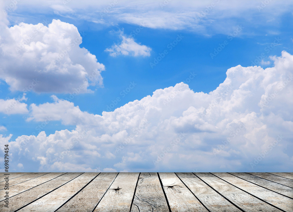 Paving wood floor with cloud and blue sky