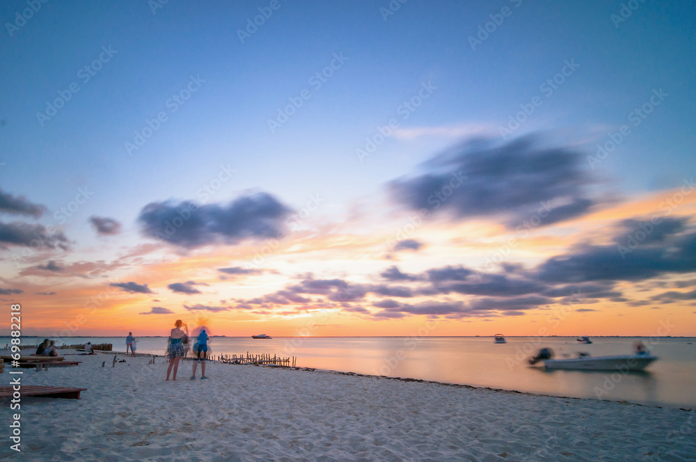 sunset on tropical beach in Isla Mujeres, Mexico
