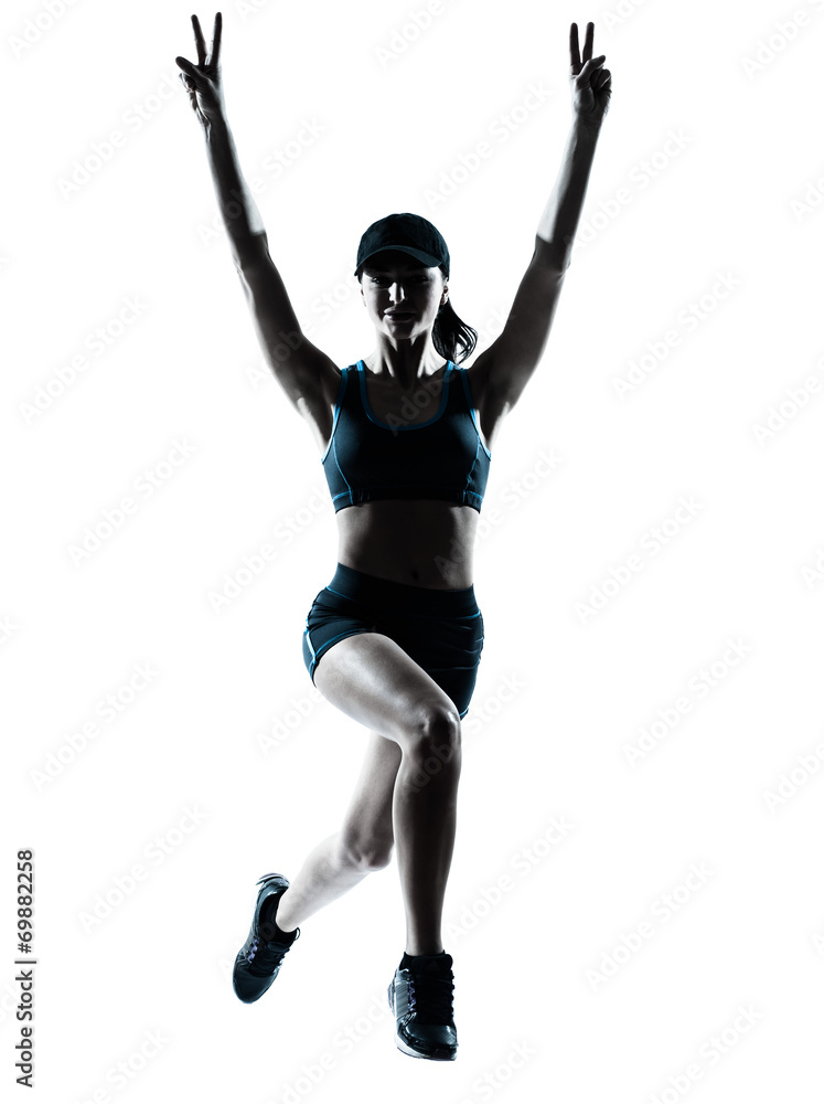 woman runner jogger jumping victorious silhouette