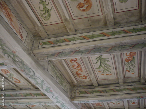 Photos Decorated ceiling inside historic building at Prague