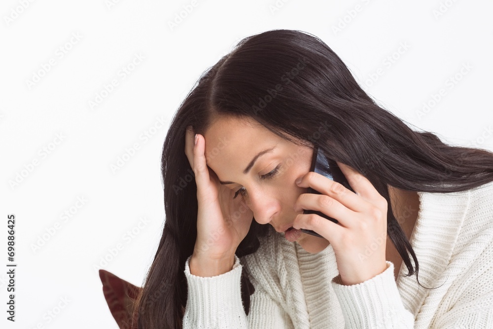Woman suffering from a migrane Woman suffering from a migrane