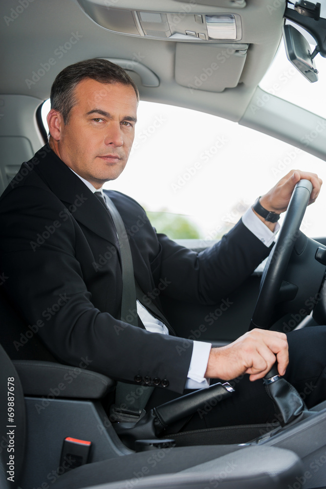 Businessman in car.