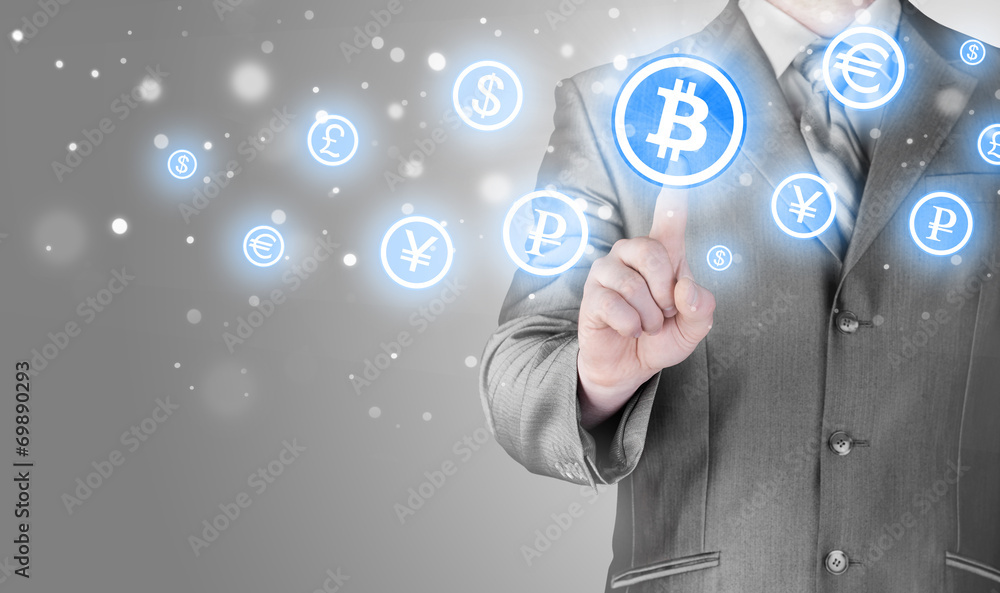 Choosing bitcoins, businessman pressing touch screen button. Choosing bitcoins, businessman pressing touch screen button.