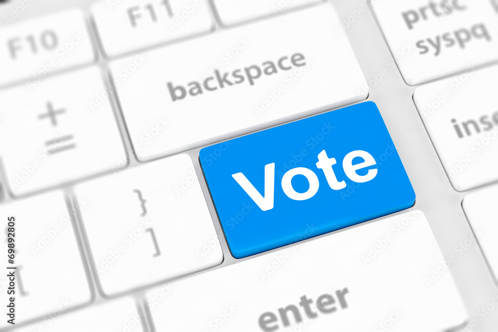 vote button on computer keyboard showing internet concept vote button on computer keyboard showing internet concept