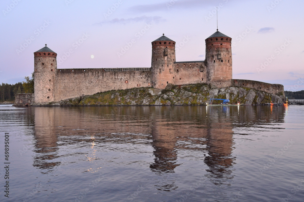 Savonlinna.  Fortress Olavinlinna at sunset