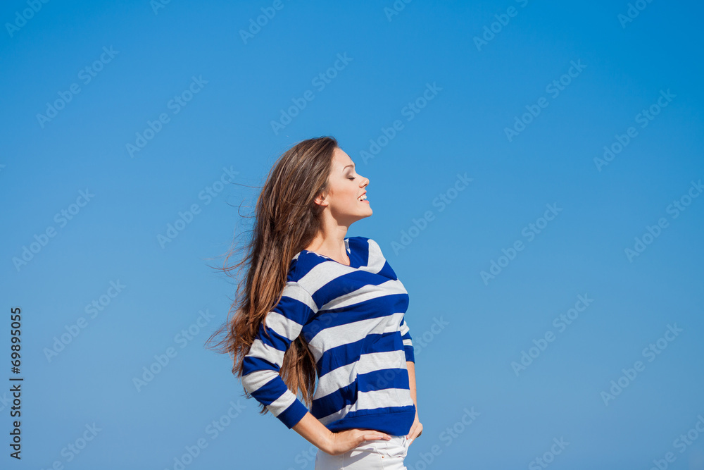 beautiful happy woman enjoying summer outdoors