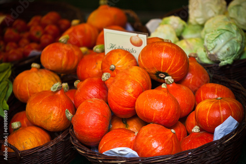 Orange pumpkins in a market