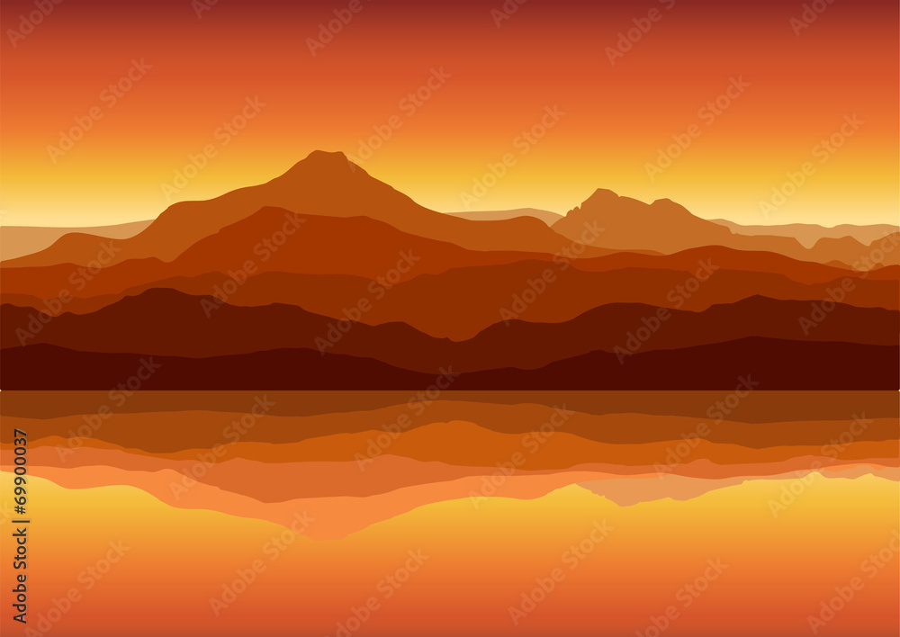 Sunset in huge mountains near lake