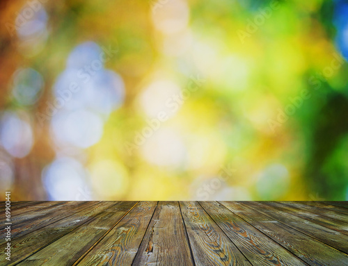 bright bokeh and wooden floor