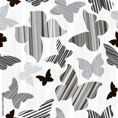 Monochrome seamless background with butterflies.