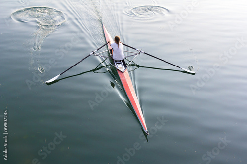 Fotografi Woman in a boat