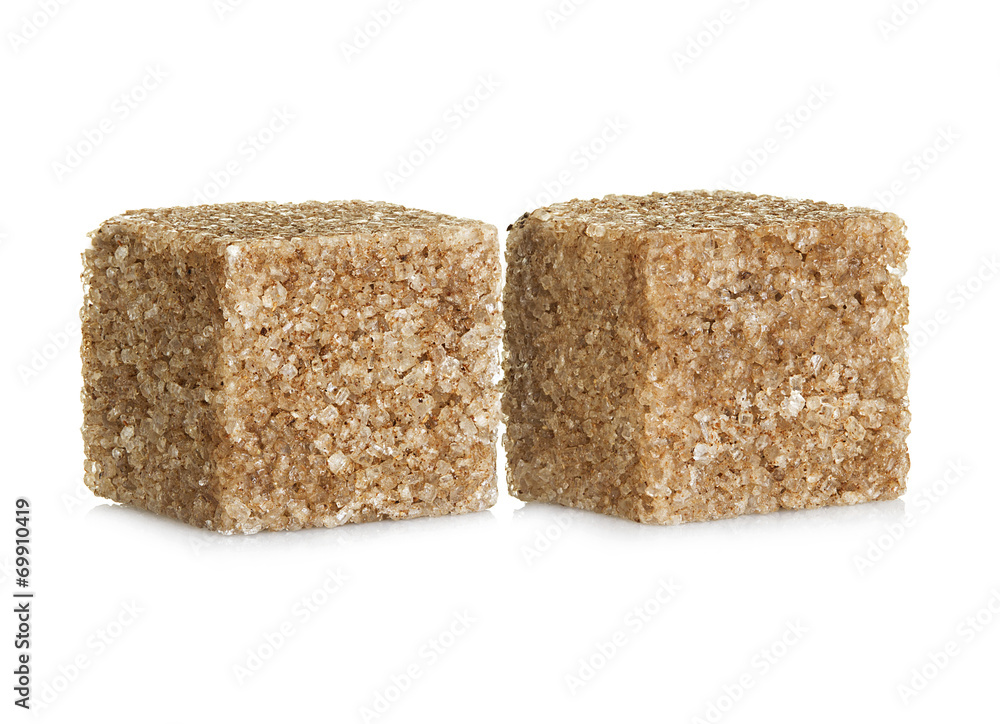 Brown sugar cubes, isolated on white background Brown sugar cubes, isolated on white background
