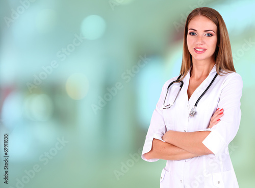 Young beautiful doctor in h...