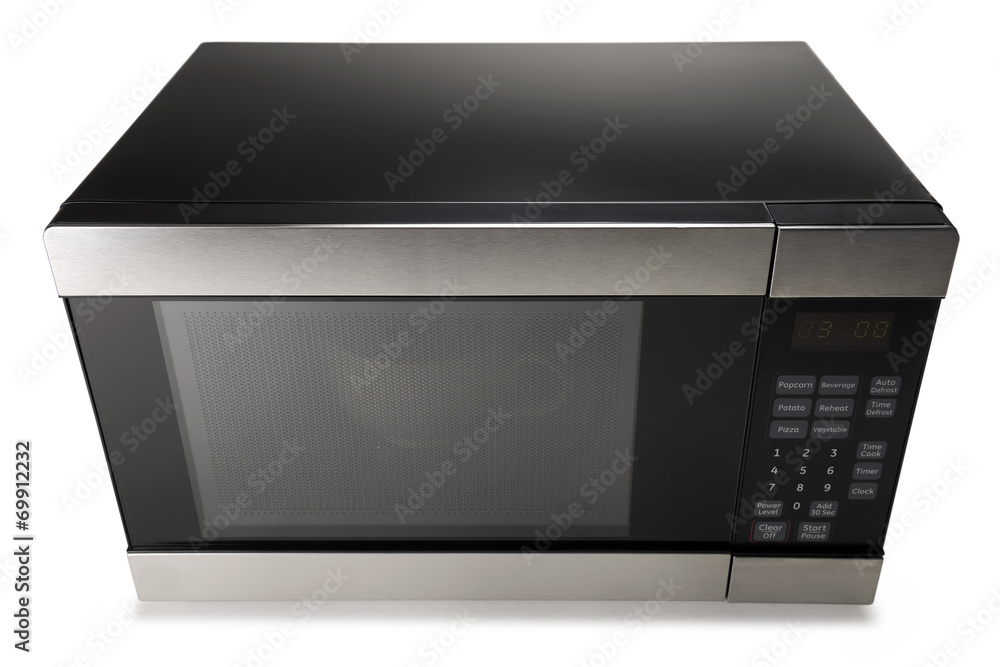 Obraz premium Microwave oven on a white background