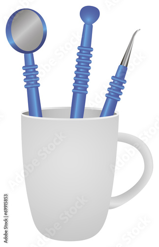 Mug with set dental instruments
