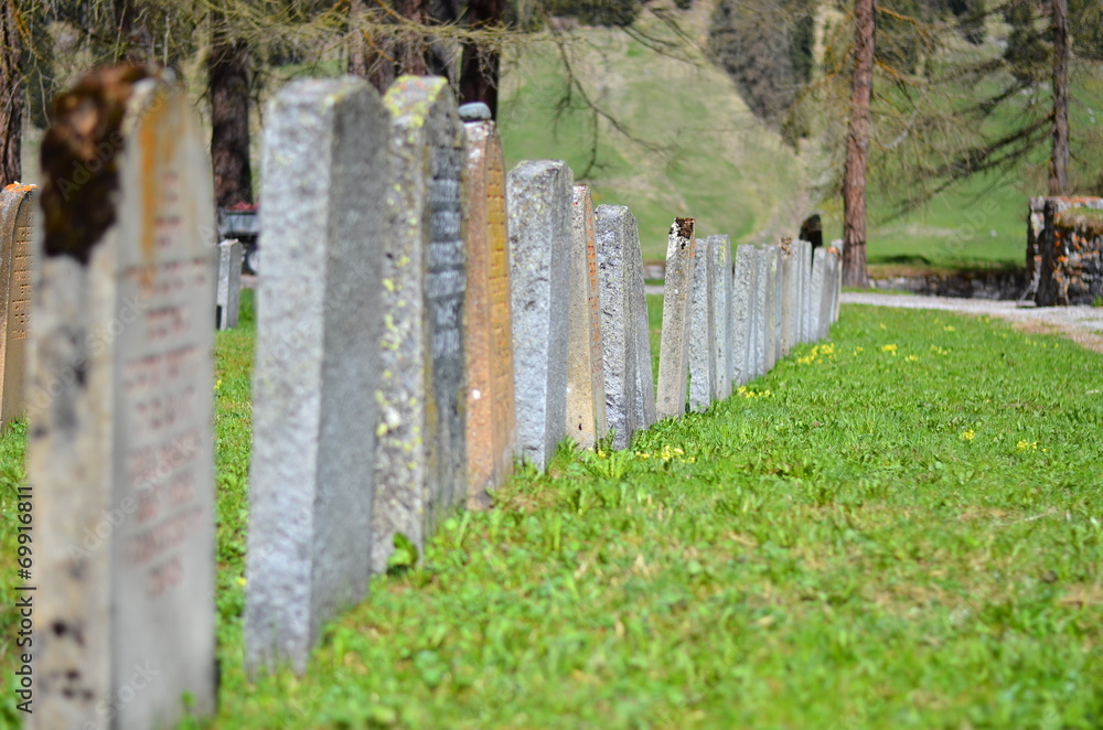Naklejka premium Gravestones at cemetery - tombs