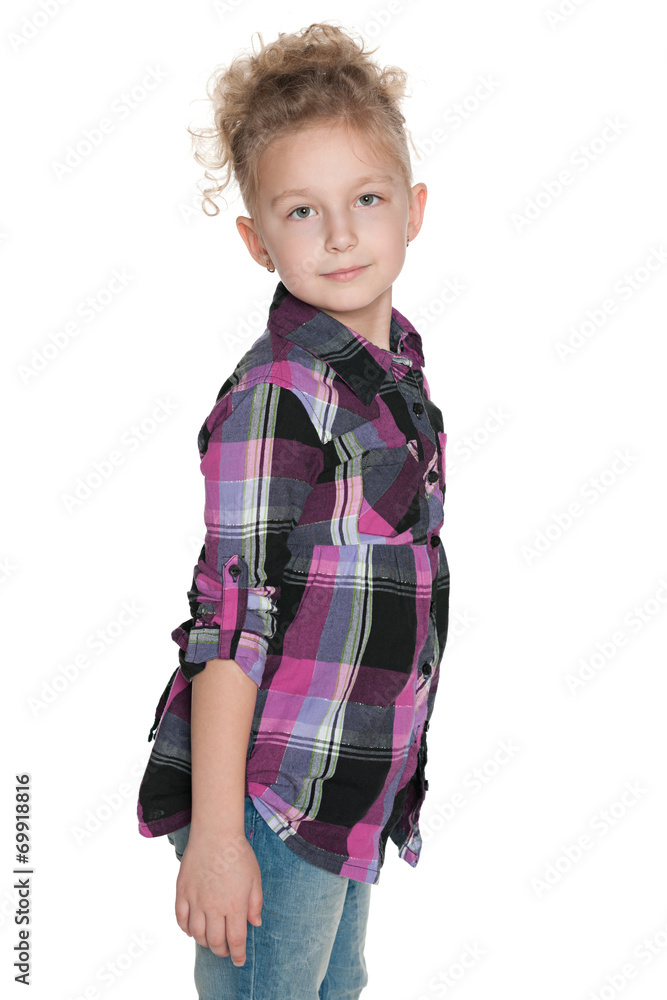 Profile portrait of a thoughtful little girl