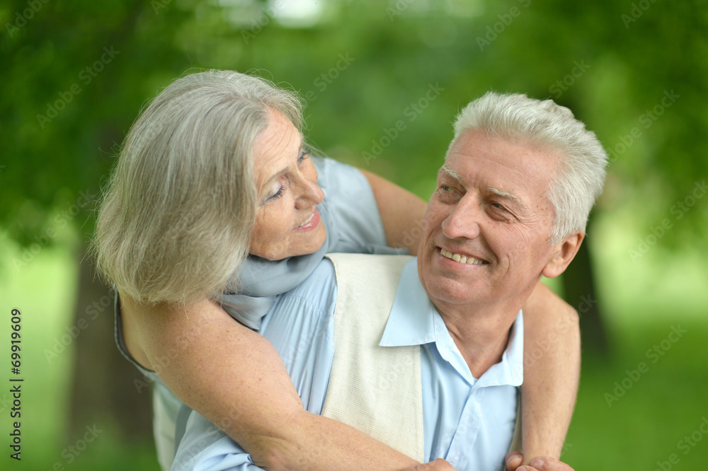 Senior couple in summer park