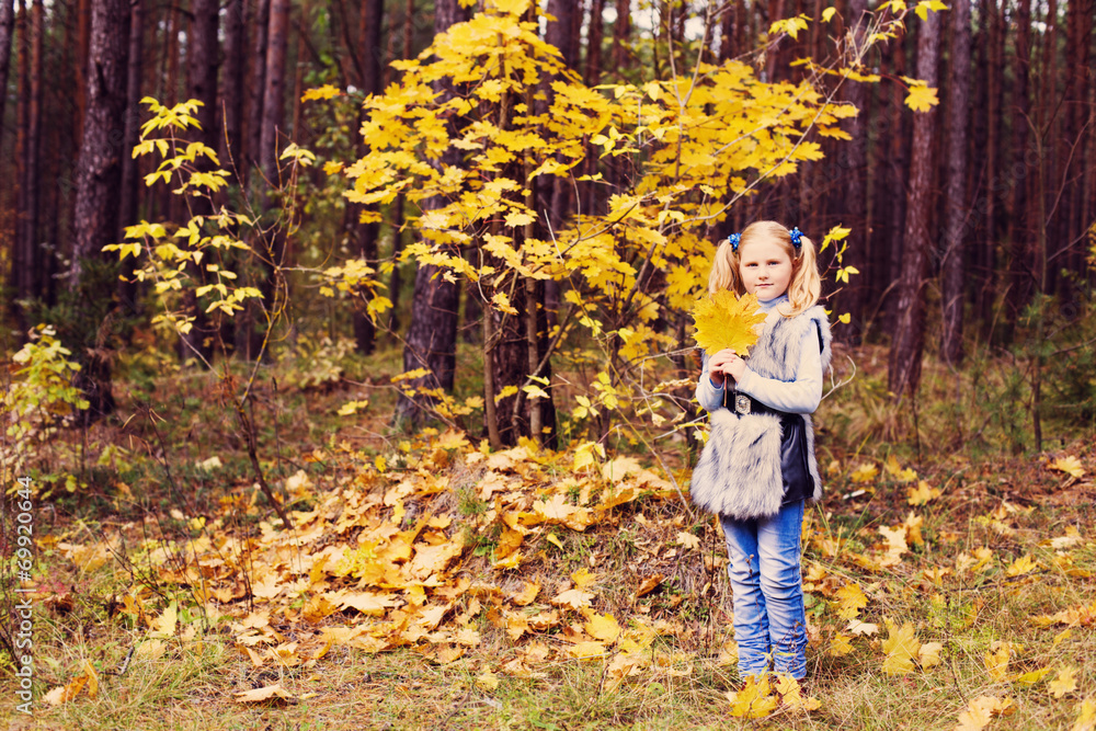 smile girl in autumn forest