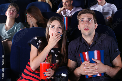 Young people watching movie...