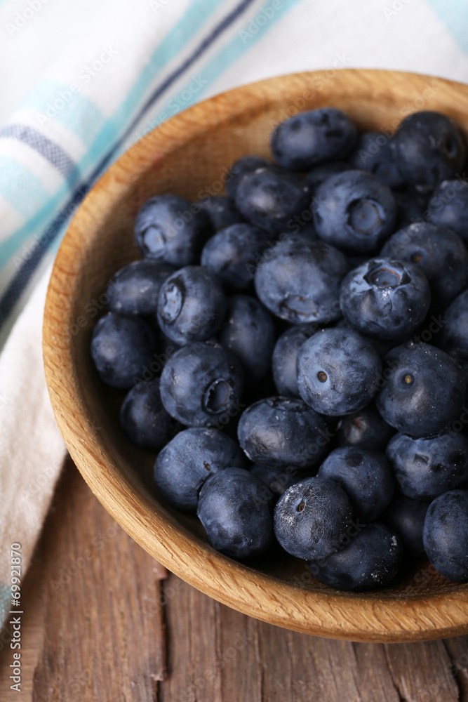 Wooden bowl of blueberries Wooden bowl of blueberries