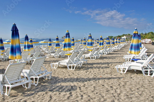 Beach chairs  the beach the Black Sea, Bulgaria © iluzia