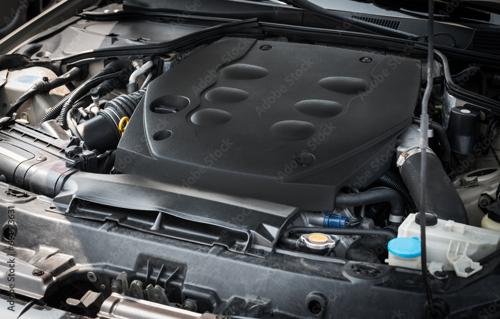 Fototapeta premium Dirty car engine, detail view. Selective focus.