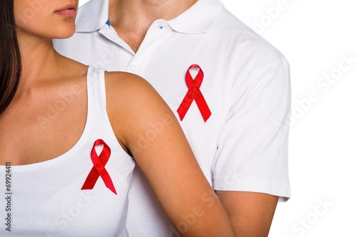 Tableau sur toile Couple supporting aids awareness together
