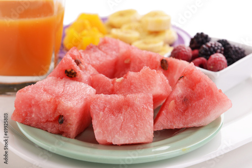 Slices of fruits with berries