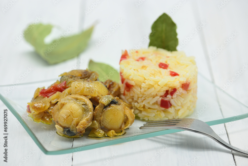 small scallops cooked with white rice and bay leaves small scallops cooked with white rice and bay leaves